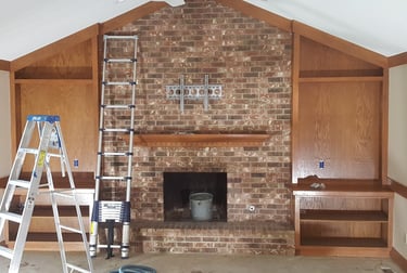 American Painting Specialist Fort Wayne, Indiana priming wood and brick for painting.