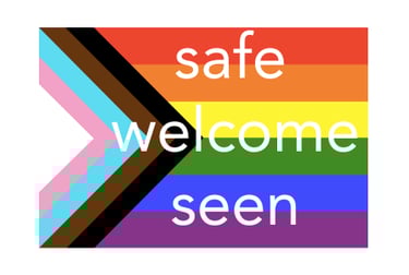 Pride flag with the words "safe," "welcome," "seen"