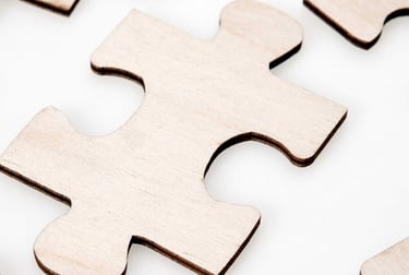 Image of wooden jigsaw puzzle piece