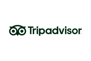 Official dark green Tripadvisor logo featuring the iconic owl icon on a solid black background.