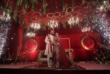 Ankit & Mehak pose during wedding ceremony in the hills of shimal at deventure in red hues 