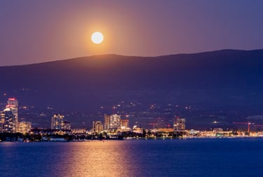 Kelowna community at night — where Aquifer Springs serves