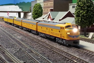 A UP passenger rolls through Tabar
