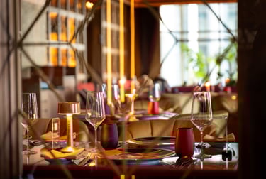 a table setting with candles and candles