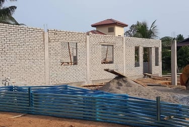 Suasana Renovations constructing new brick house structure and interior work.