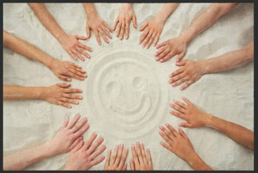 a group of people's hands holding hands in a circle