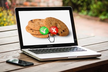 a laptop with some cookies on the screen