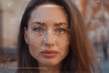 a woman with a facial recognition system on her face