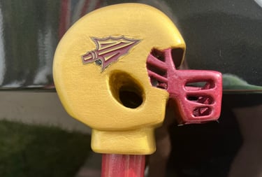 Carved pointy thingy Football Cane