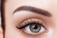 a woman with a beautiful eyeliners and a pair of lashes