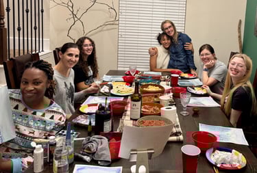 Women enjoying a Ladies’ Night watercolor painting class at Kelley’s Neighborhood Art