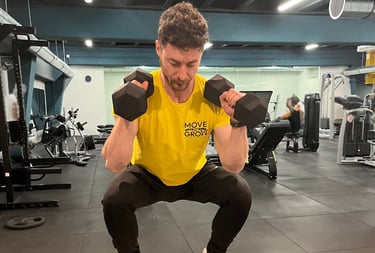 a man in a yellow shirt is doing a box - like thing