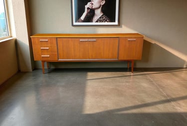 Scandinavian Danish design sideboard with clean lines, showcasing timeless Mid-Century Modern craftsmanship.