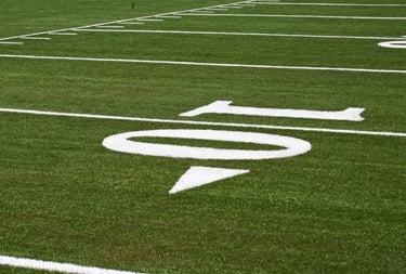 a view of the 10 yard line of a football field