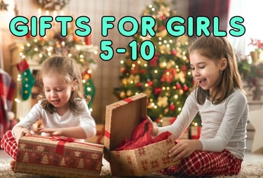 two girls sitting on the floor with gifts