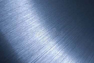 Brushed blue metal surface with a polished steel texture and reflective light gradient.