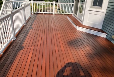 Deck staining and refinishing in Scituate, MA. completed by Michael Cummings Painting