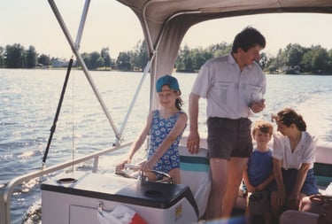 Childhood photo of Kinga boating on Lake Couchiching.