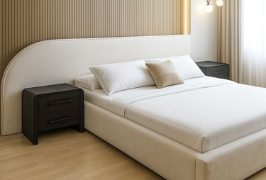 Custom wide headboard extending past nightstands behind a neatly made bed, styled with soft textures by solo home decor