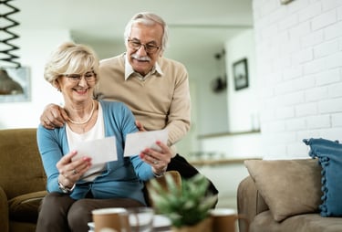 a man and woman sitting on a couch