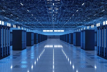 Blue-lit data center with rows of server racks, illustrating secure cloud infrastructure and scalabl