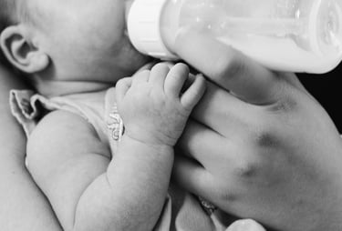 baby bottle-fed infant