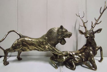 "Wildlife-themed brass artwork showing lion attacking deer-Prepared for export"