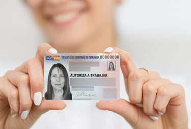 a woman holding a card with a picture of a woman's face