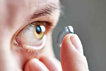 contact lens being inserted