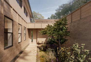 Modern brick and wood home entry courtyard with a minimal garden