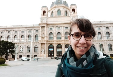 Blanca Moncunill-Solé at the front of the Natural History Museum building of Vienna (Austria).