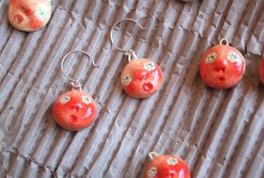 flower eye earrings