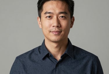 Professional headshot of a team member in a minimalist North American / US studio setting. Natural, flattering light and a neutral professional background.