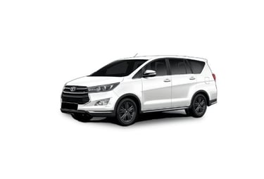 a white Toyota Innova car parked on a white background