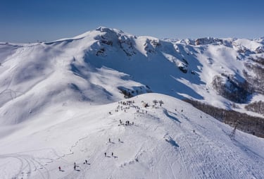 Aerial view of Bjelasica moutain under snow in Kolasin ski resort in Montenegro
