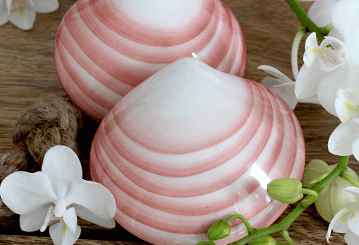 Spezialmassage mit Muscheln, italienisch