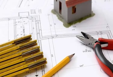 Blue prints and planning tools used fro architectural design and home construction