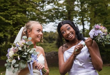bride photographed with her maid of honour on her wedding day
