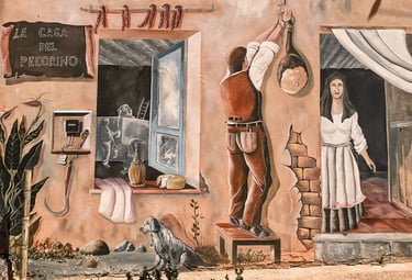 Mural in Tortolì, Sardinia, depicting daily life scene with shepherd and woman