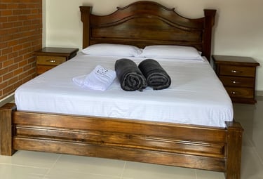 a bed with towels and towels on it
