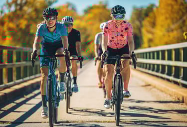 Recreational athletes cycling alone the road
