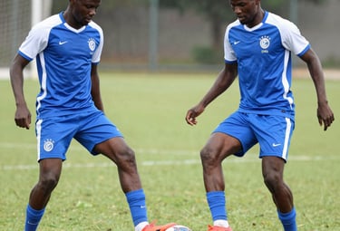 Players practicing corner kicks and free kicks during a training session.