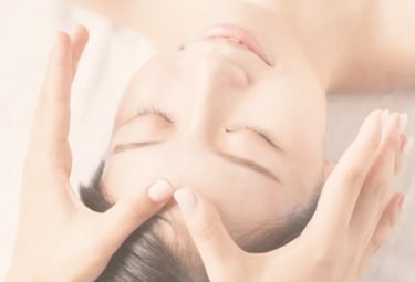 a woman is shown with her hands on her head