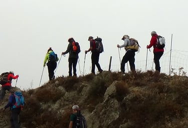eight day-hikers on a ridgeline