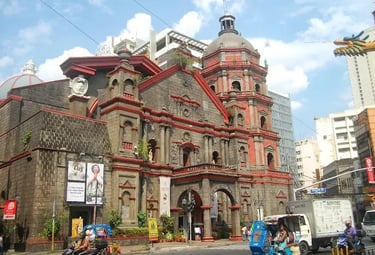 a large building with a clock tower in the middle of it