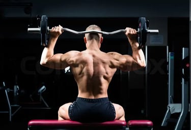 a man doing a back - up on a bench with a barbell