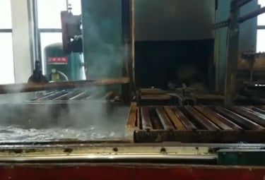 Rotational curing and cooling process for fitness ball production