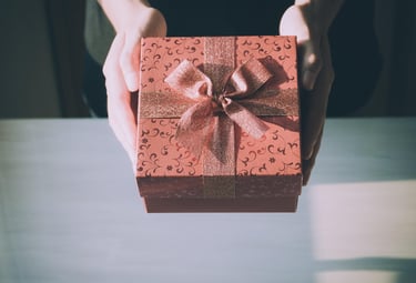 Handing a gift box