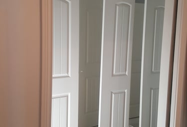 American Painting Specialist Fort Wayne, Indiana freshly spray painted doors.