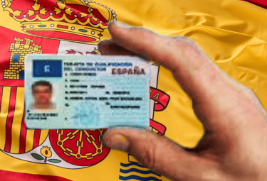a person holding a passport card with a picture of a person holding a passport